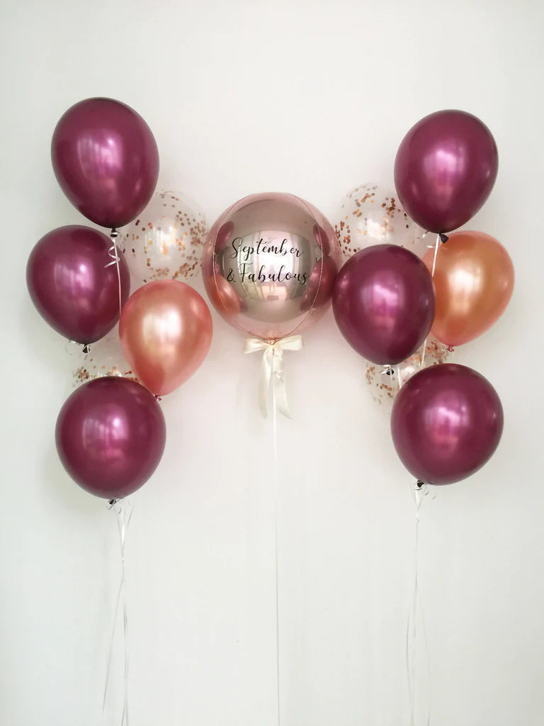 مجموعة بالونات من الذهب الوردي