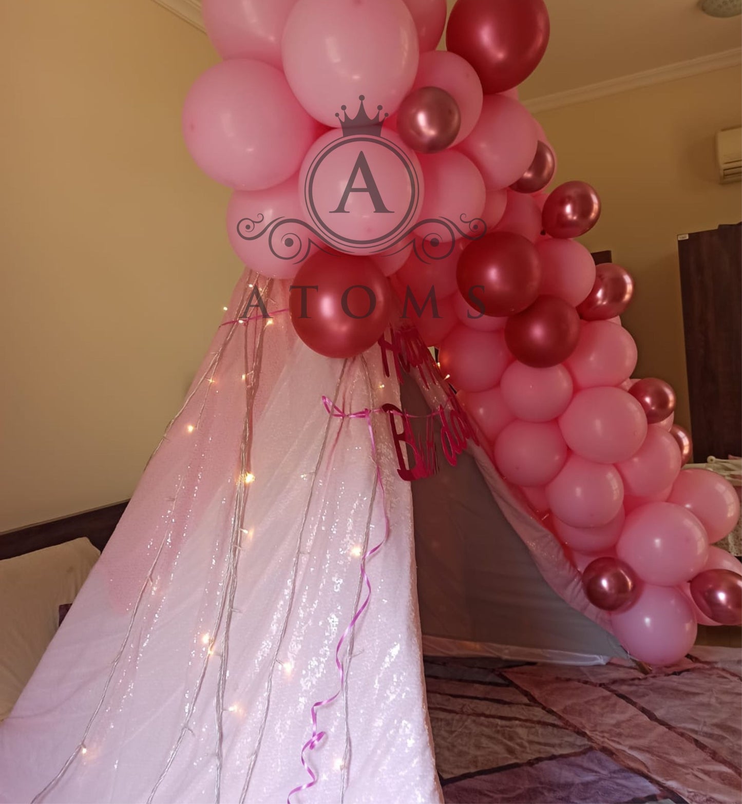 Tent décor with balloon arch