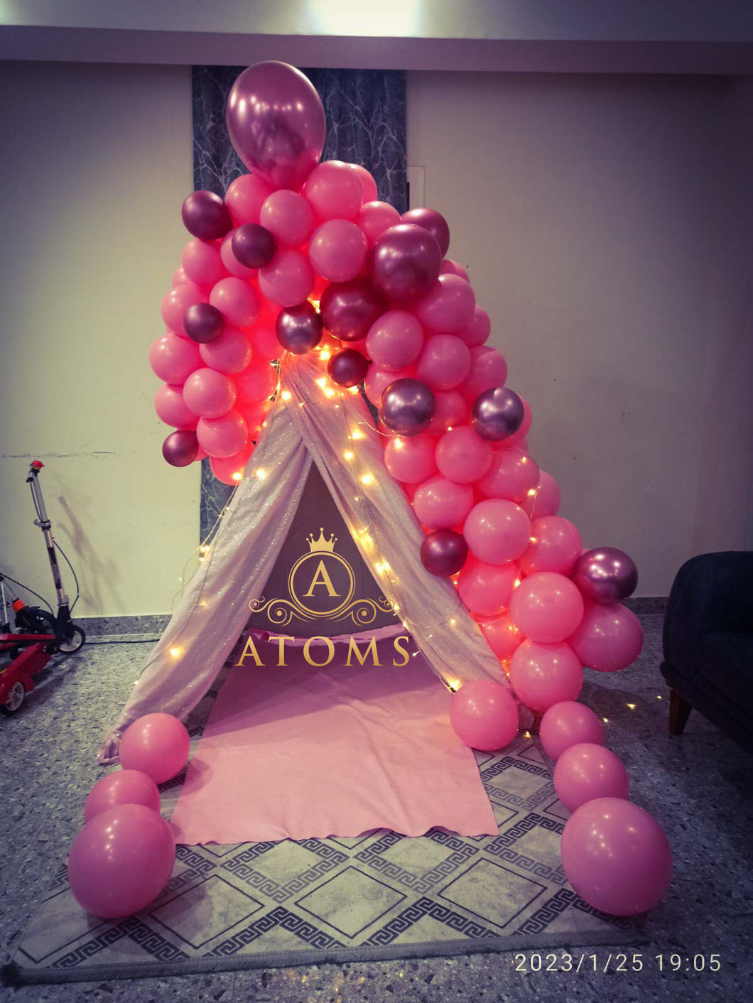 Tent décor with balloon arch